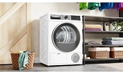 Сушильная машина Bosch WQG1420AME пан.англ. кл.энер.:A++ макс.загр.:9кг белый