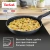 Сковорода Tefal Force 4218924 круглая 24см покрытие: Titanium ручка несъемная (с крышкой) черный (9100048321)