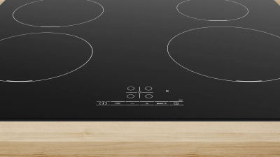 Индукционная варочная поверхность Bosch PUE611BB6E черный